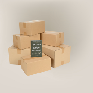 Stack of brown cardboard boxes with a book titled 'Fry's Guide to Music Licensing' on a beige background